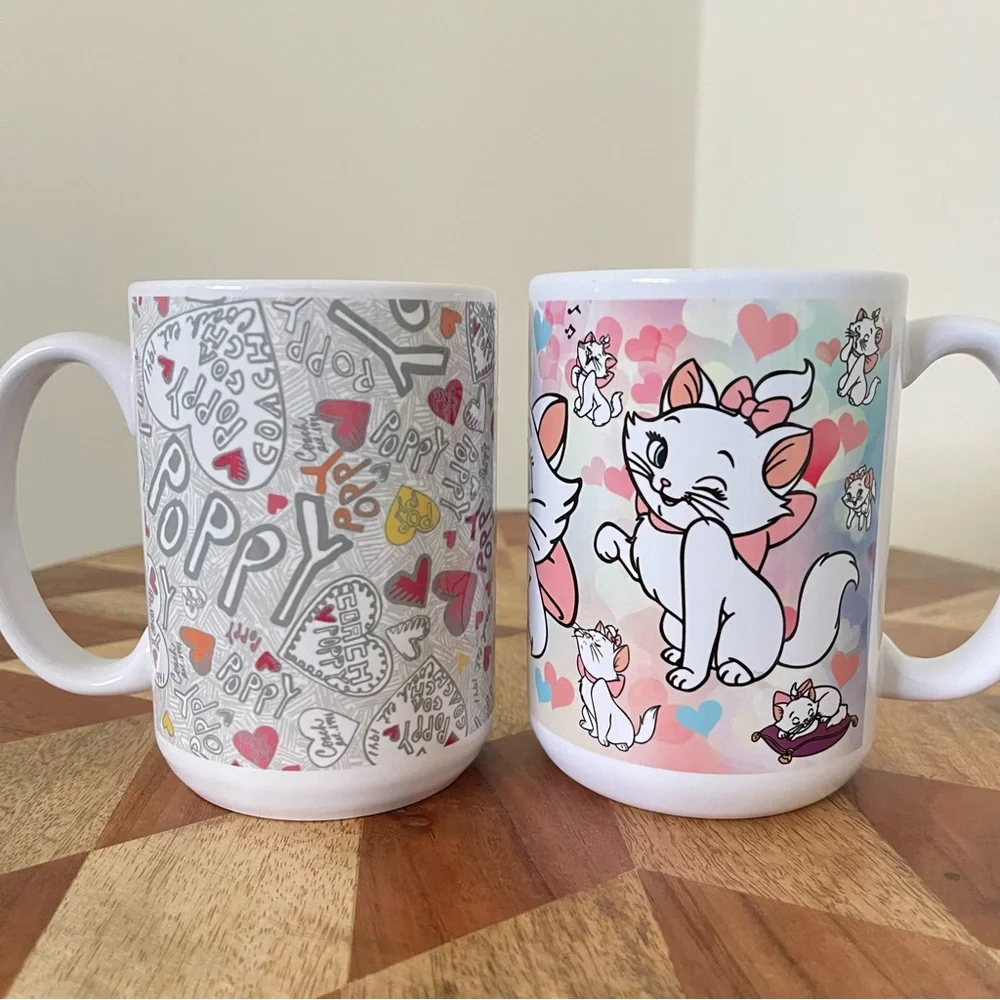 NEW 2 Pcs Mugs. Disney The Aristocats Marie + Poppy 15oz mugs. NWT Hand Crafted